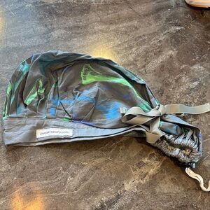 Purple Canary Scrub Cap with Green and Blue tibias